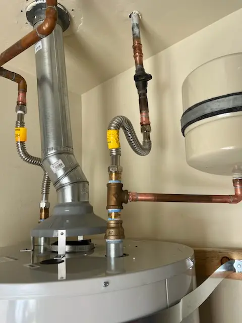 Water heater installation and plumbing repair in Ward